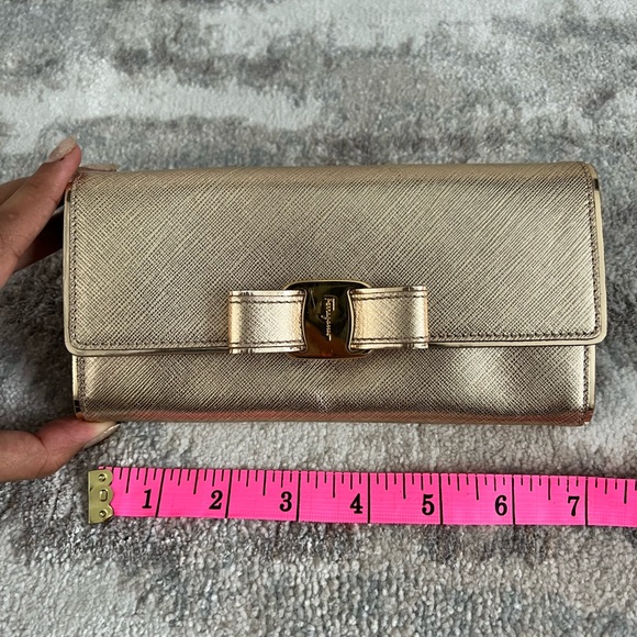 Authentic Gold Salvatore ferragamo wallet. - Picture 1 of 4